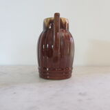 Pitcher in enamelled faience