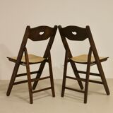 Pair of vintage folding chairs year 50 sculpted backrest.