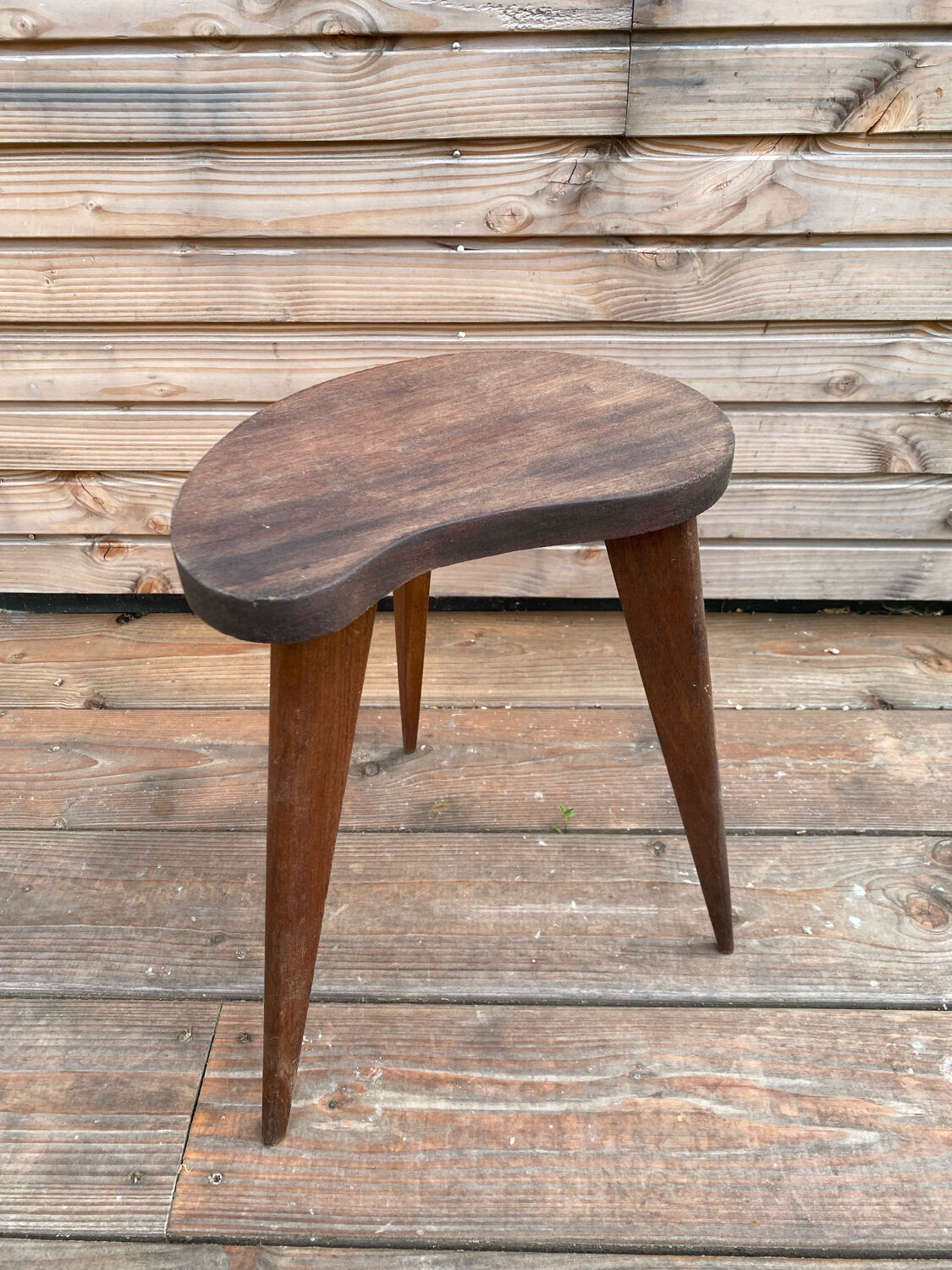 Teak stool in a bean shape
