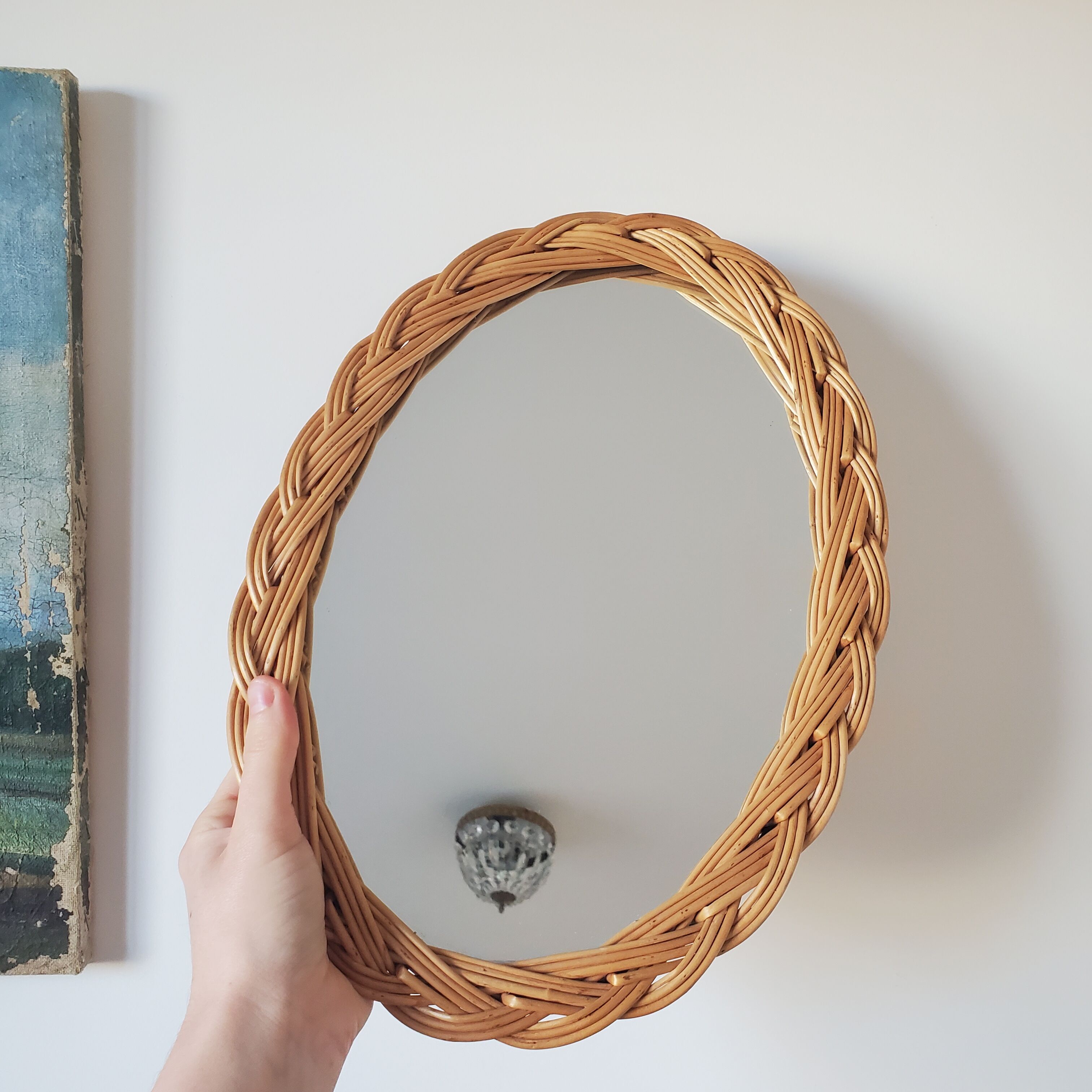 Oval mirror in braided wicker