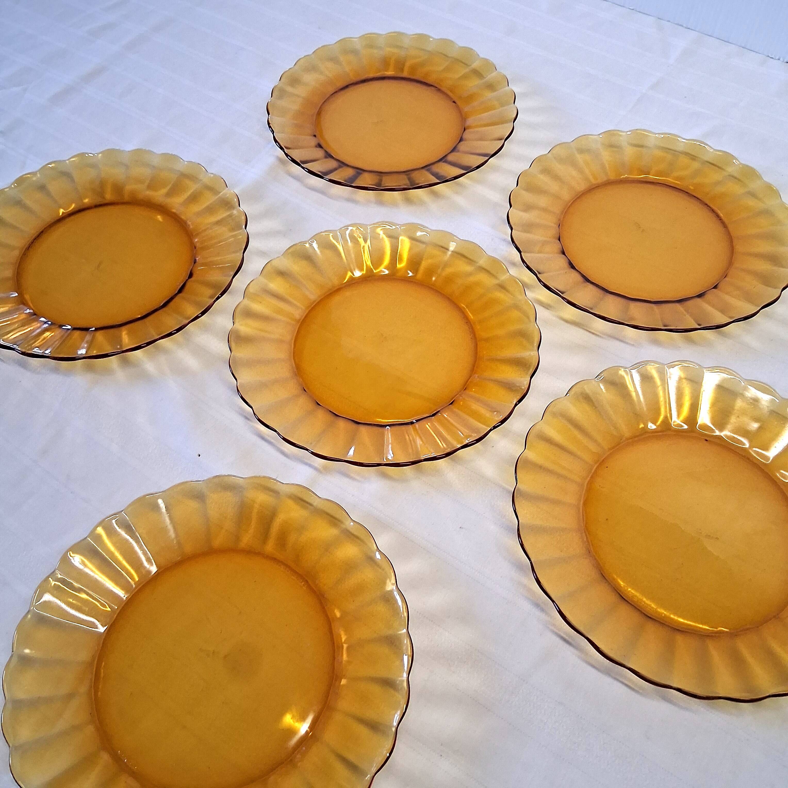 6 Duralex dessert plates in good condition, made of amber-yellow glass