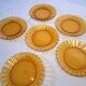 6 Duralex dessert plates in good condition, made of amber-yellow glass