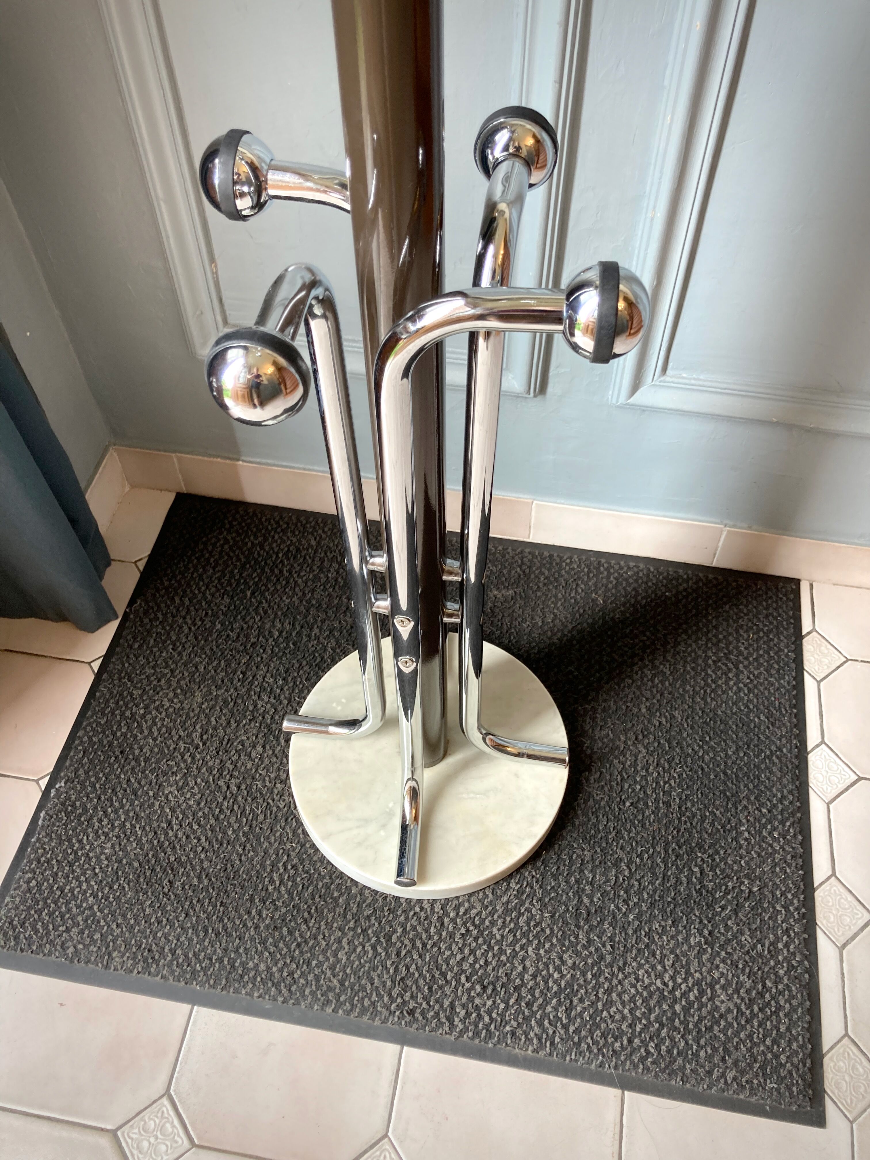 Coat rack on vintage stand