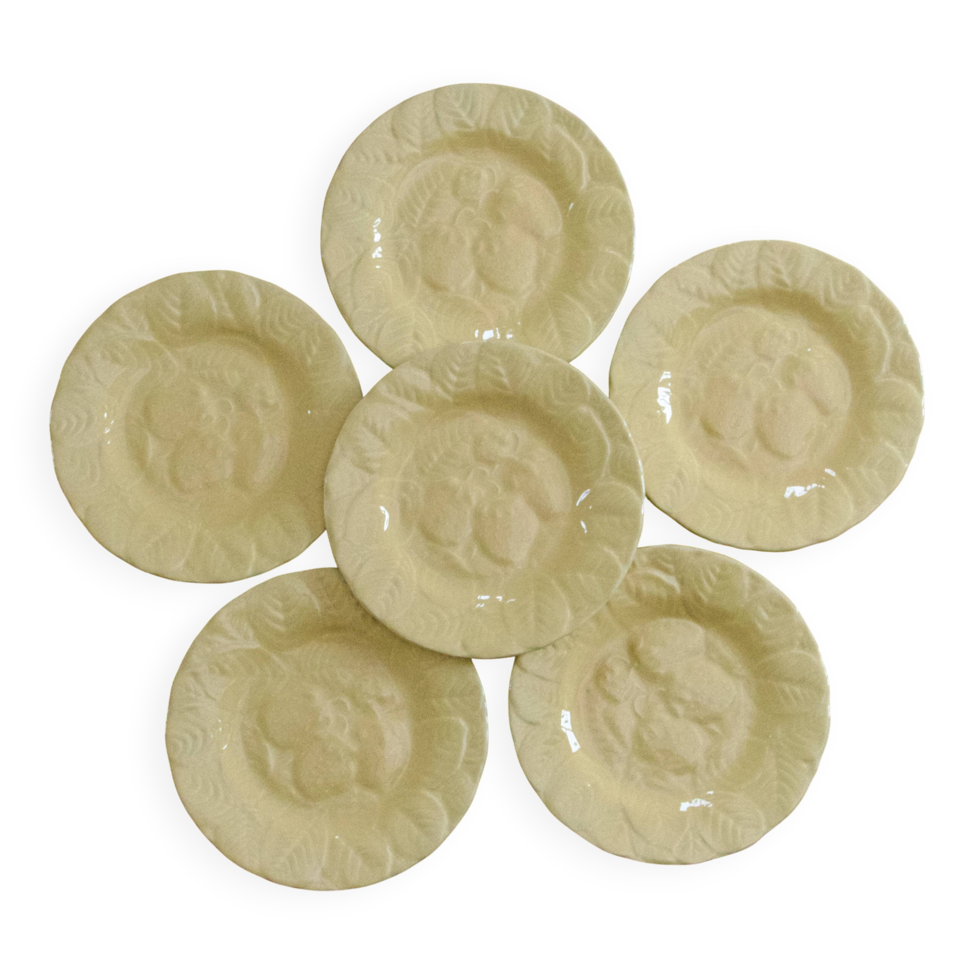 Yellow strawberry slipware plates signed Genevieve Lethu