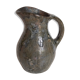 Potter's pitcher Art-popular in old enamelled earth