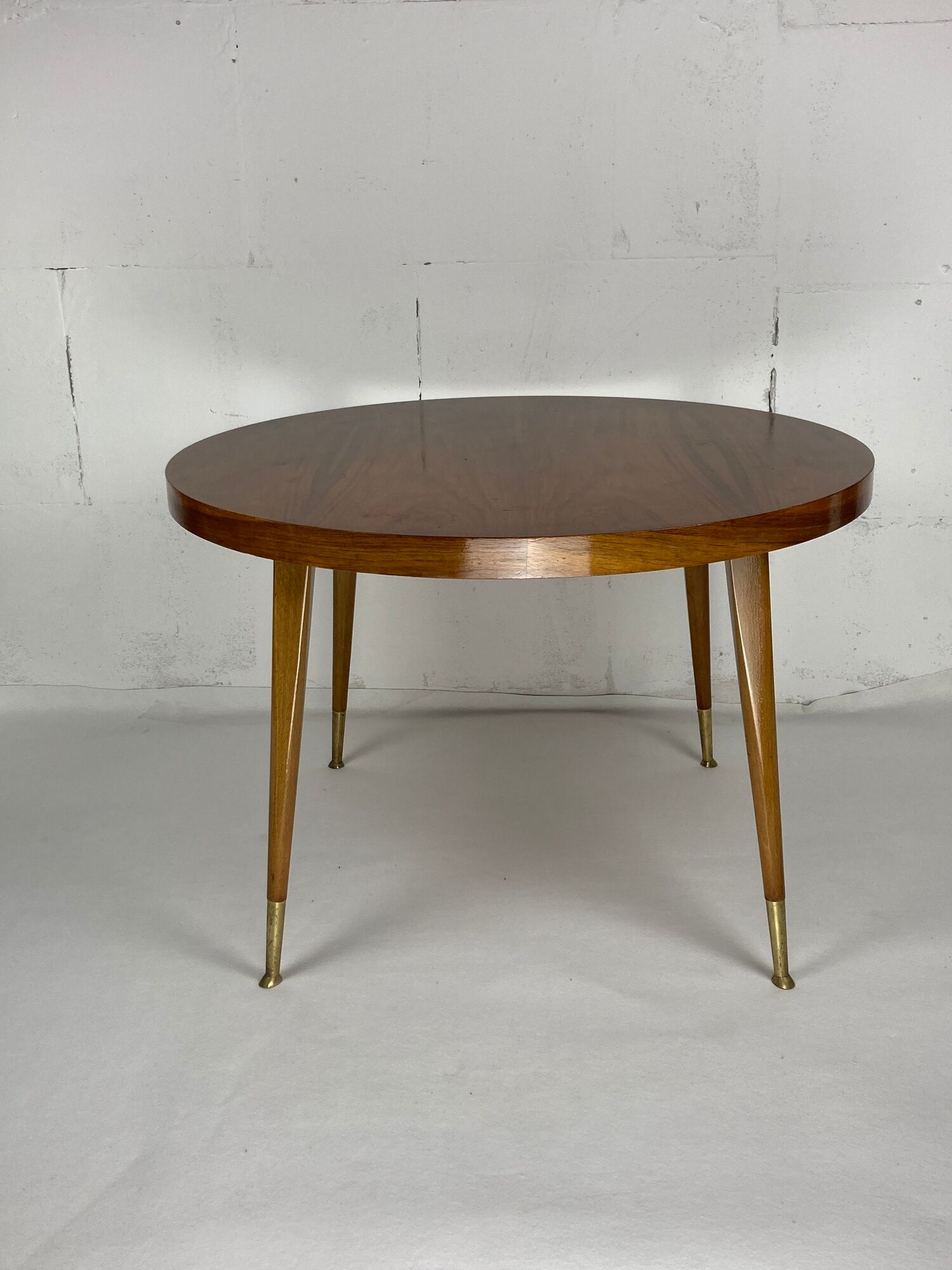 Italian round table with tapered brass leg ends, 1950s
