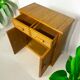 Vintage wooden and rattan chest of drawers