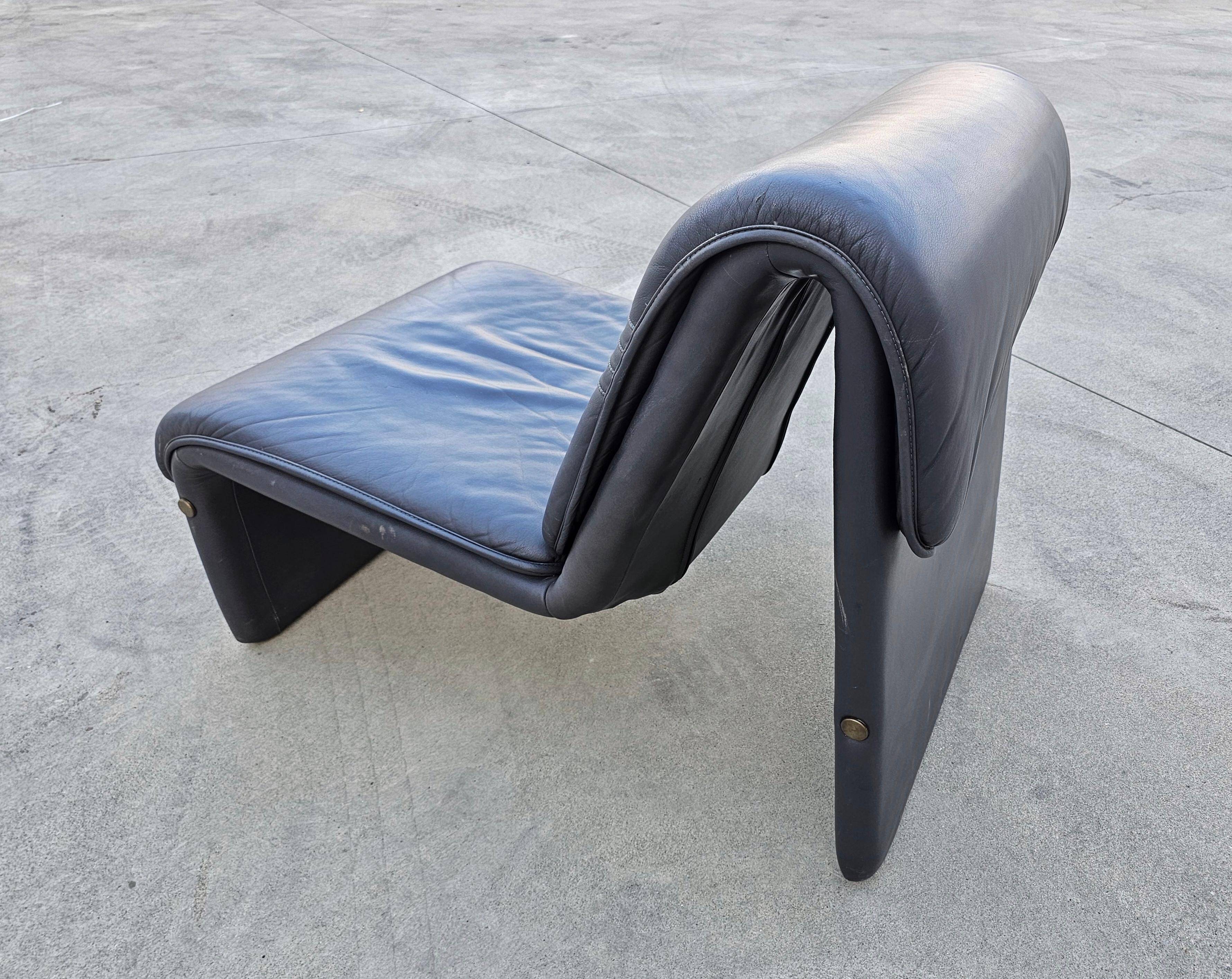 Postmodern leather lounge chairs in the style of Etienne Fermigier 1978.