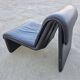 Postmodern leather lounge chairs in the style of Etienne Fermigier 1978.