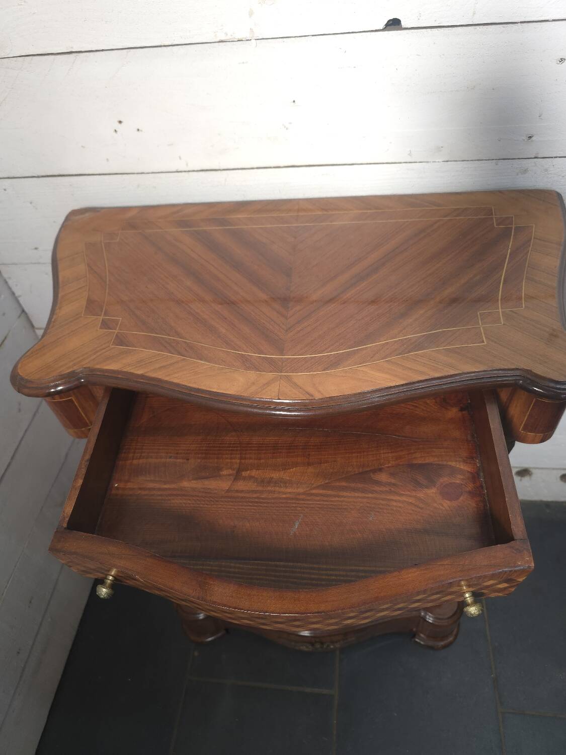 Small support table in Louis XV style with marquetry and bronze.