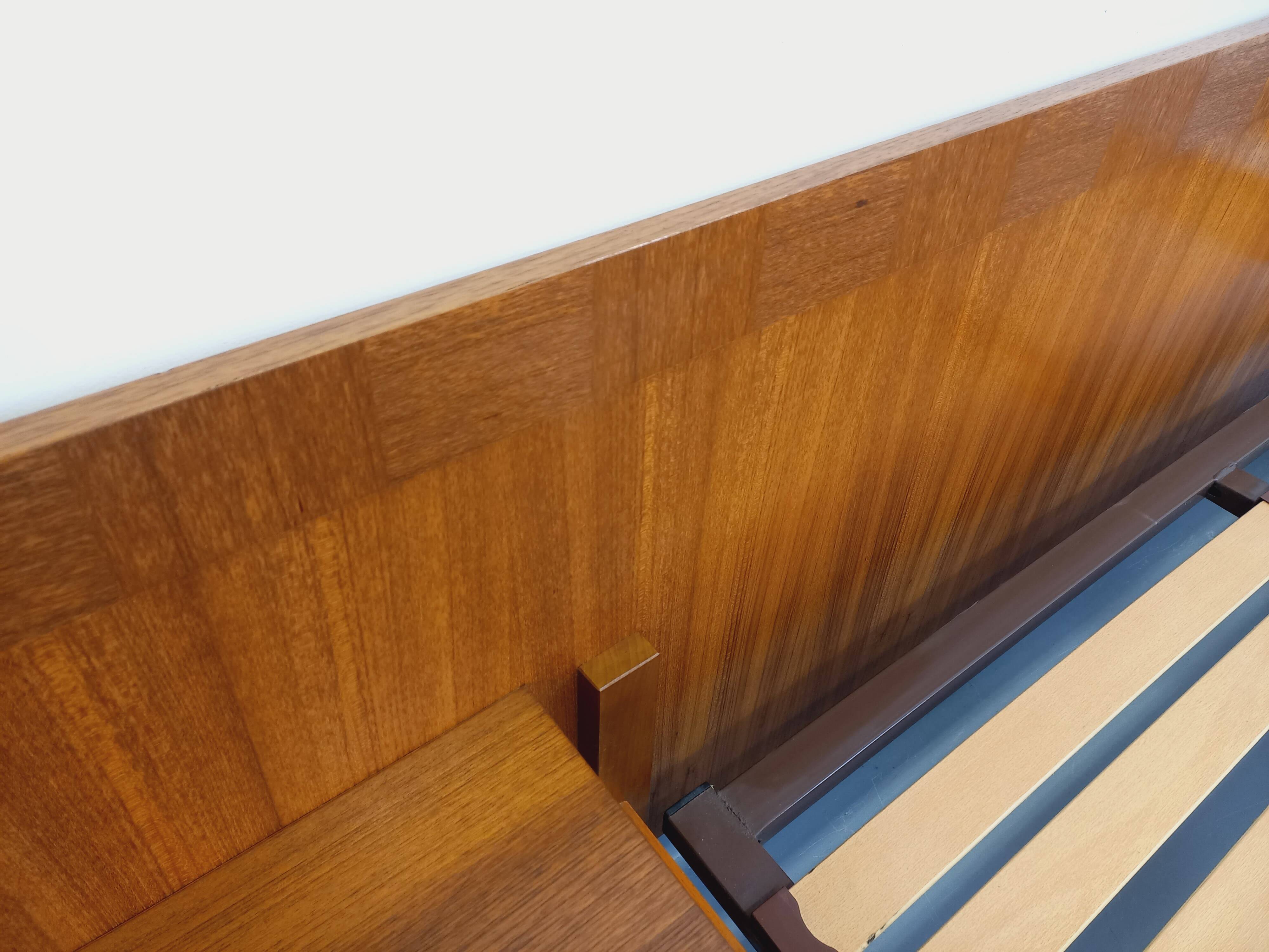 Double bed vintage Scandinavian in teak from the 1960s with integrated bedside tables.