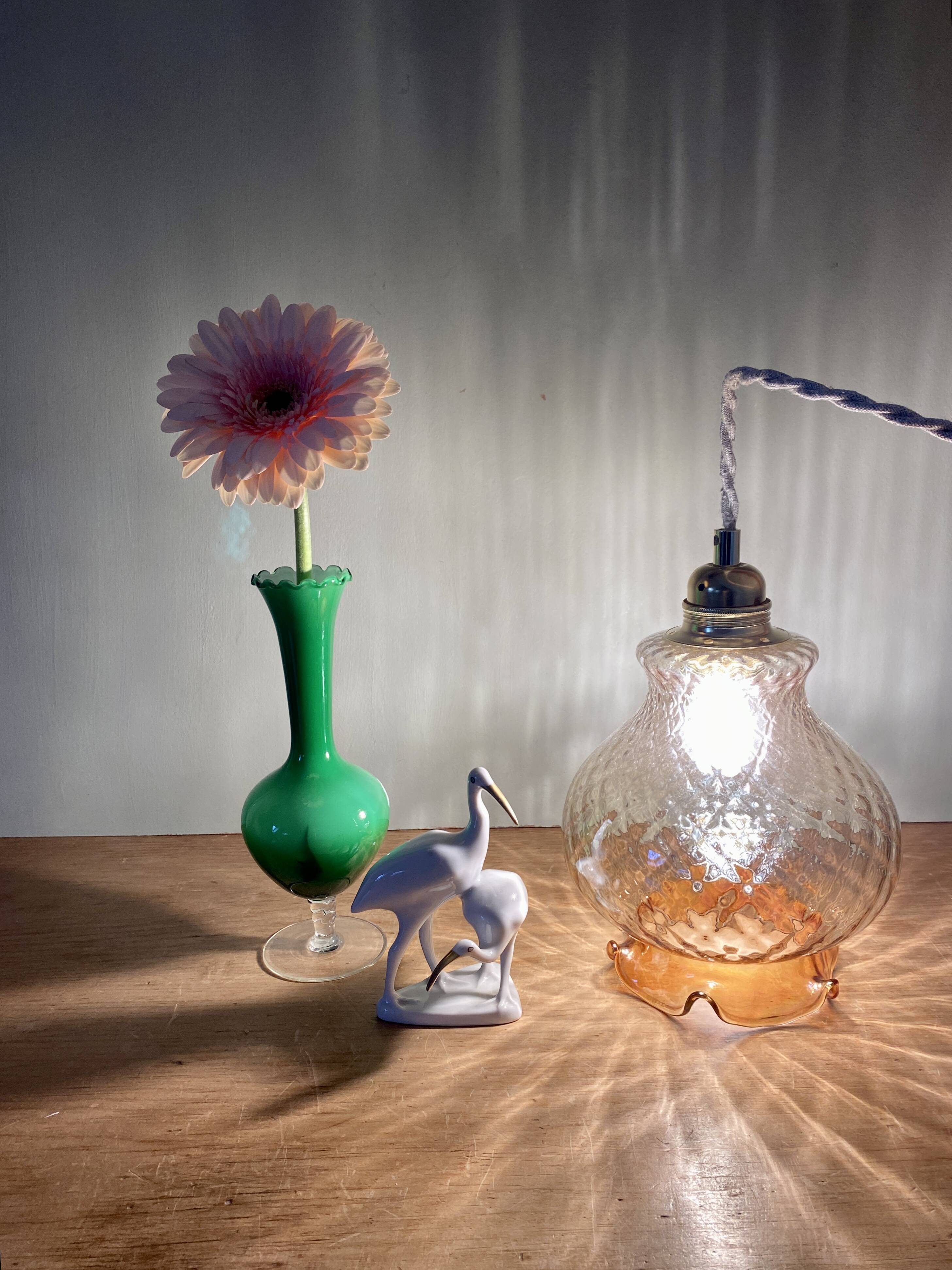 Vintage globe pendant light in amber glass