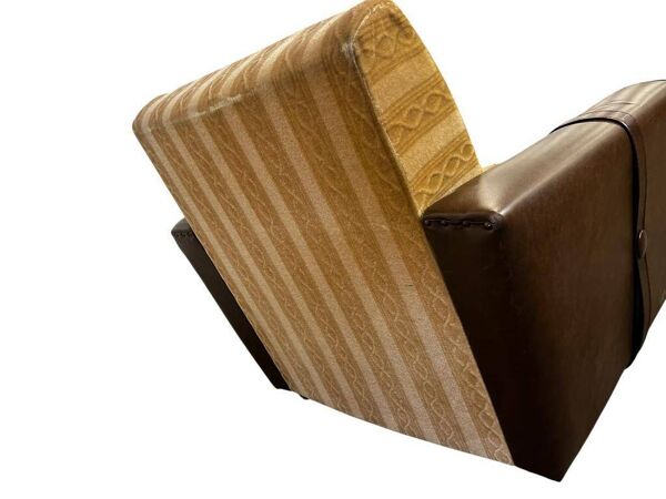 Fauteuil vintage brun / oker / un siège sur roulettes