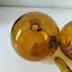 Duo of blown glass carafes – Biot signed – Bubbled amber glass