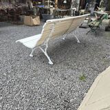 Old cast iron garden bench and wooden slats