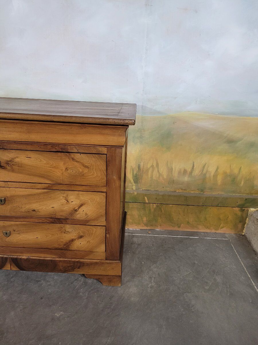 Louis Philippe period chest of drawers in solid walnut.