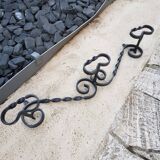 Wrought iron wall coat rack