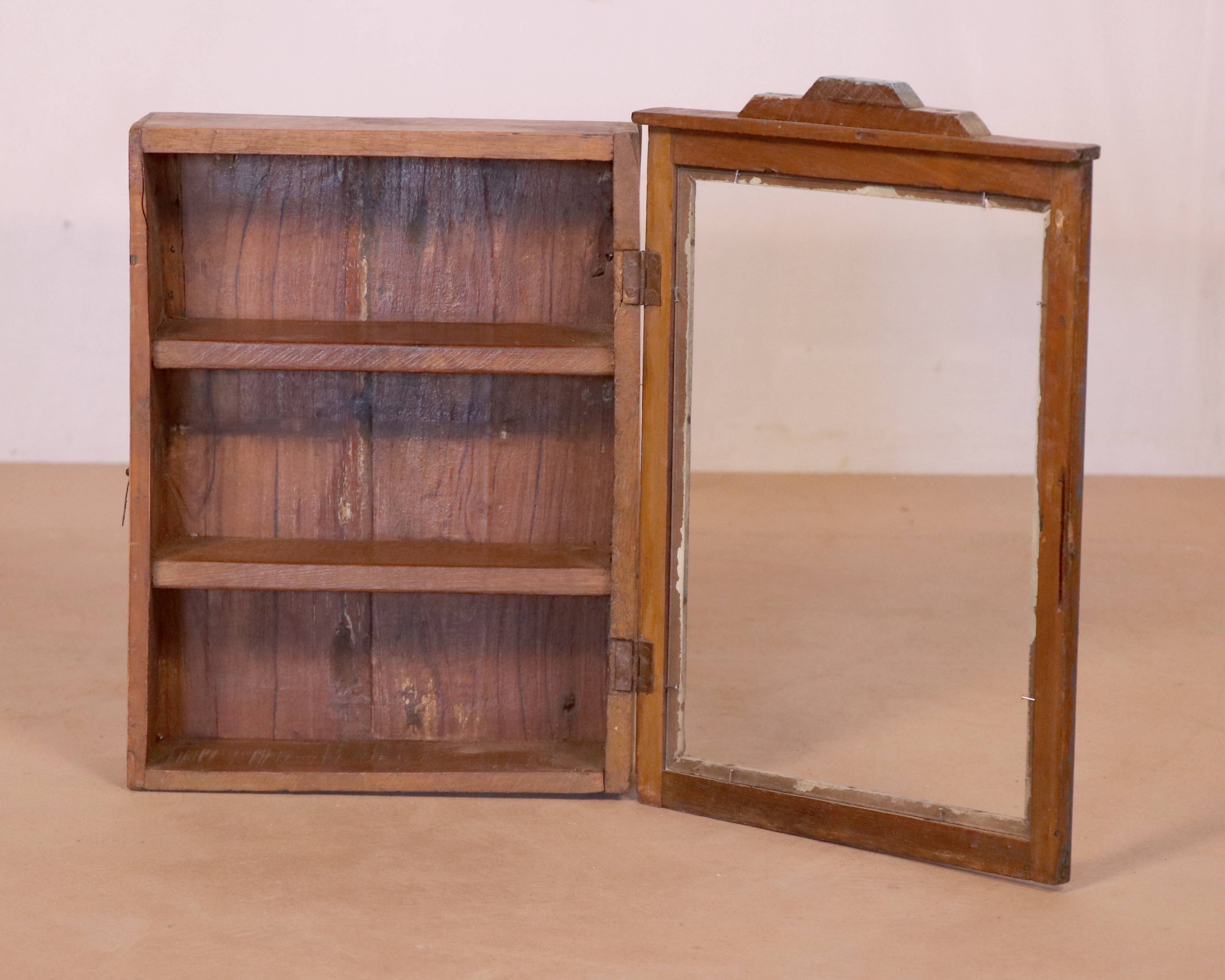 Old art deco wall display case in burmese teak