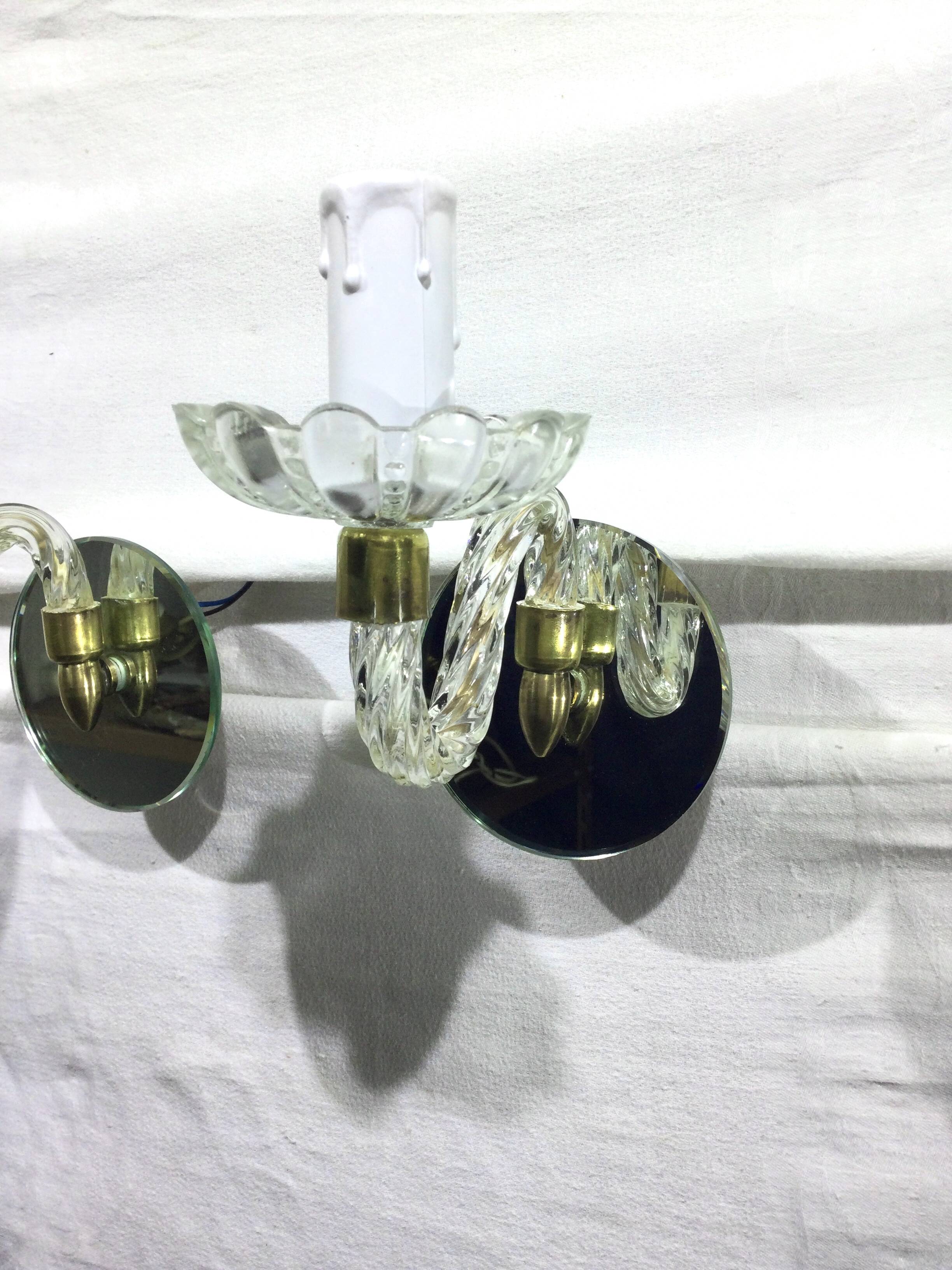 Pair of glass and mirror sconces