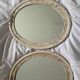 paire de miroirs ovales anciens