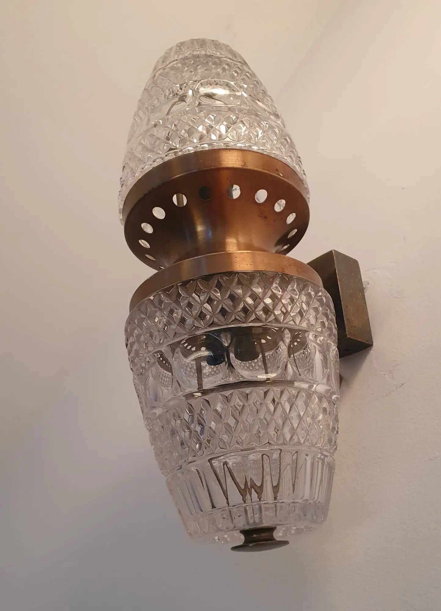 Vintage brass wall sconce with two glass globes