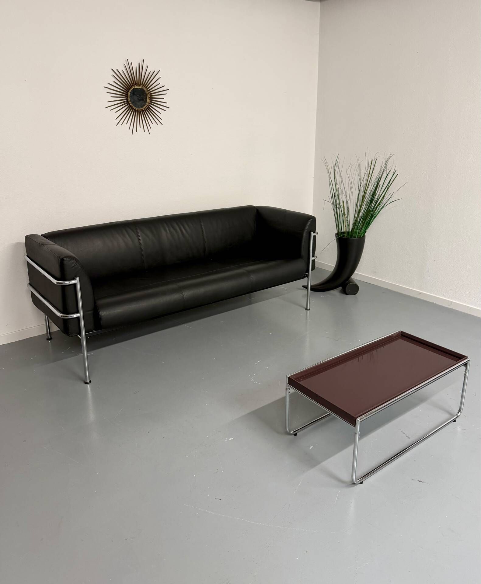 Three-seater tubular chrome and black leather sofa by Kébé, Denmark 80