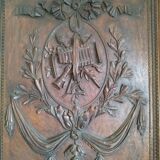 Carved wooden panel décor with music trophy