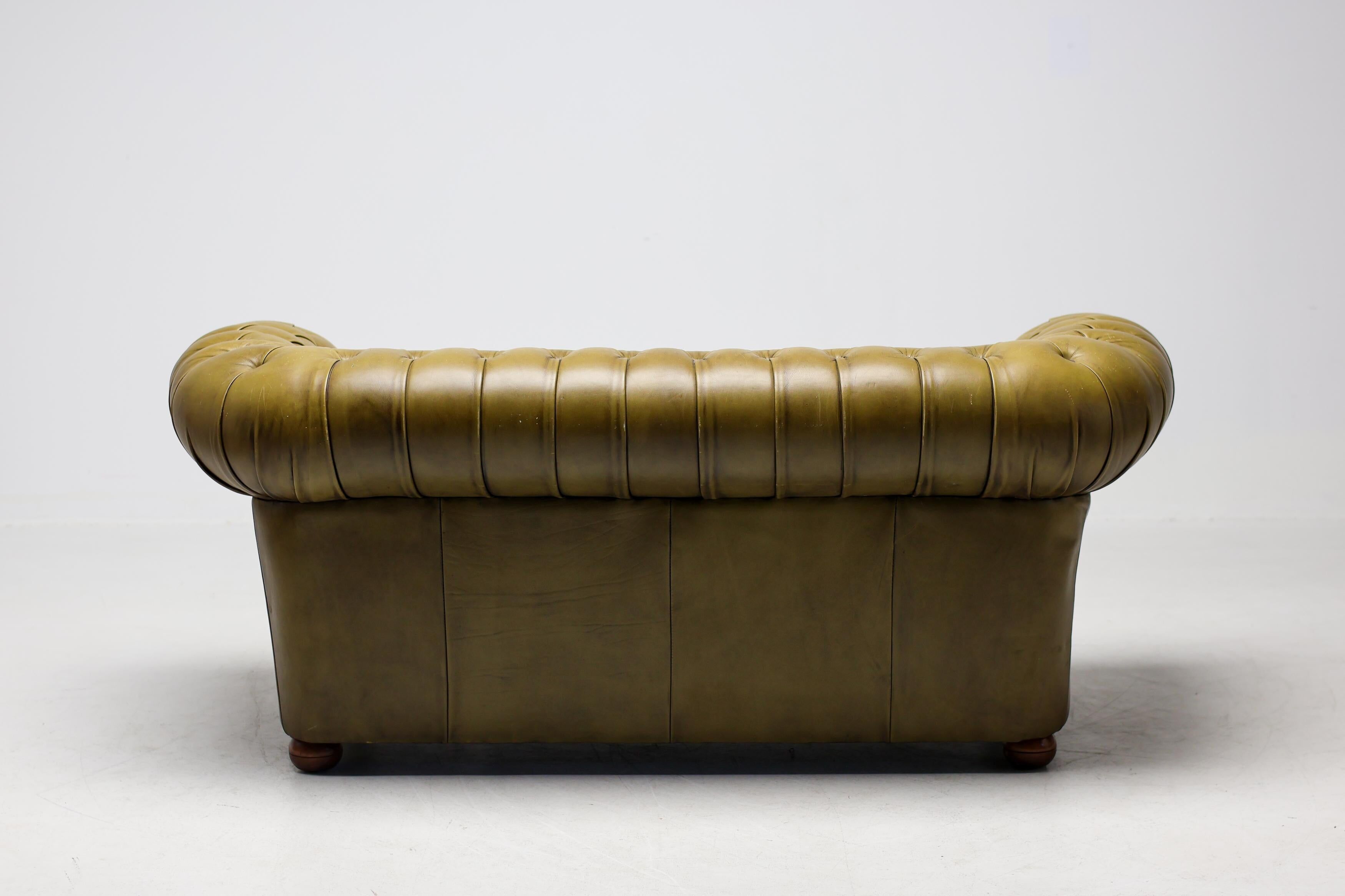 Vintage mid-century Chesterfield sofa in Greene & Greene leather.