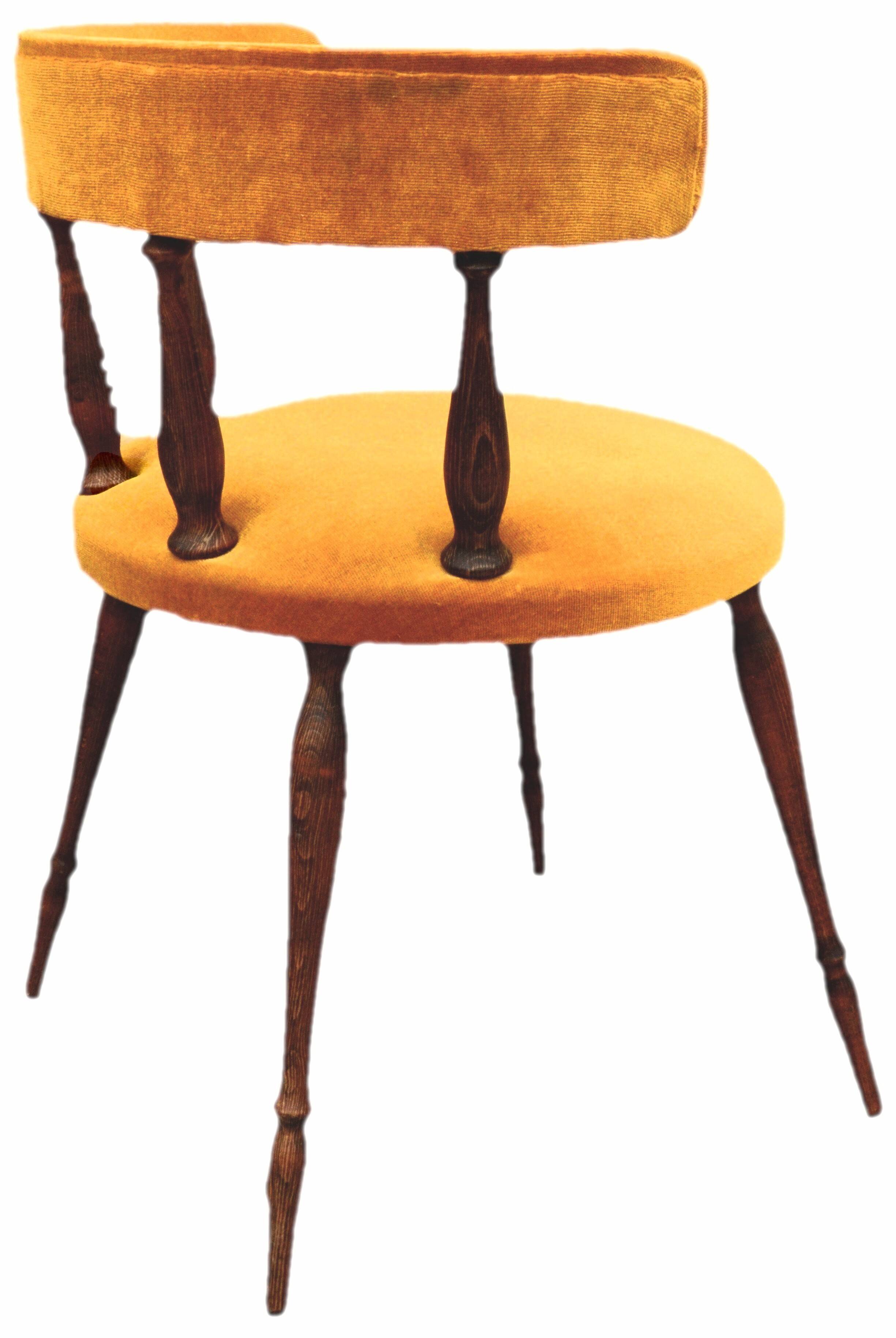 Mustard gondola armchair in the style of Helmut.