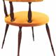 Fauteuil gondole couleur moutarde dans le style de Helmut