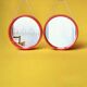 Pair of vintage round red plastic mirrors