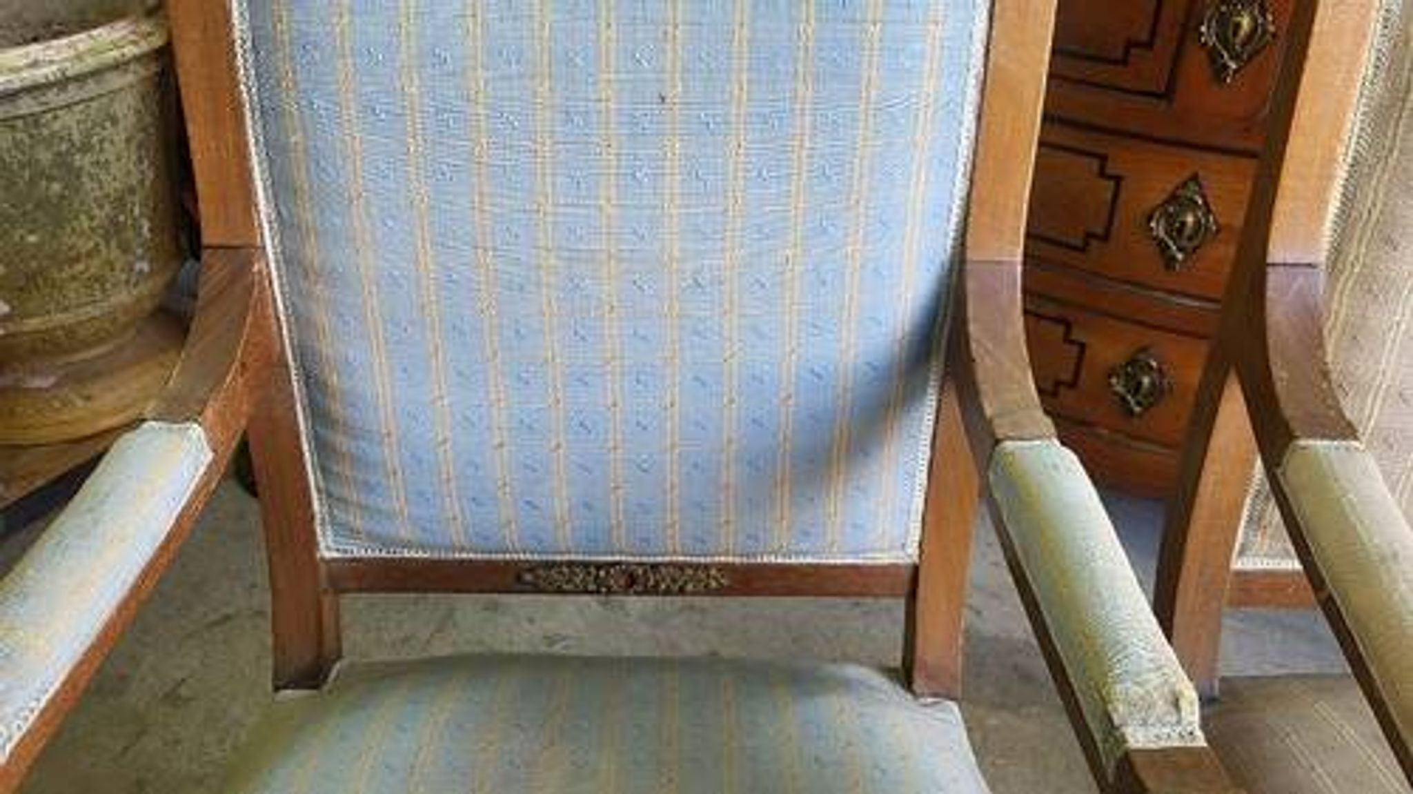 Pair of walnut armchairs in Empire style, Egyptian revival.
