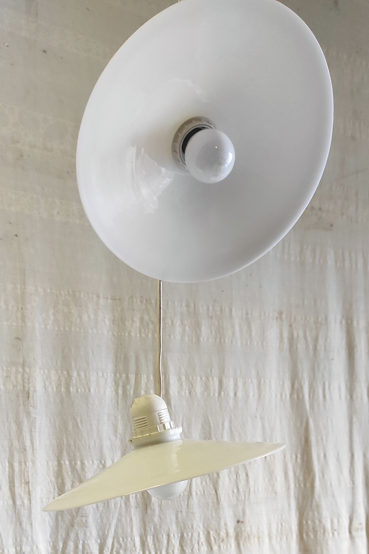 Suspension with three opaline lampshades - mid 20th century.