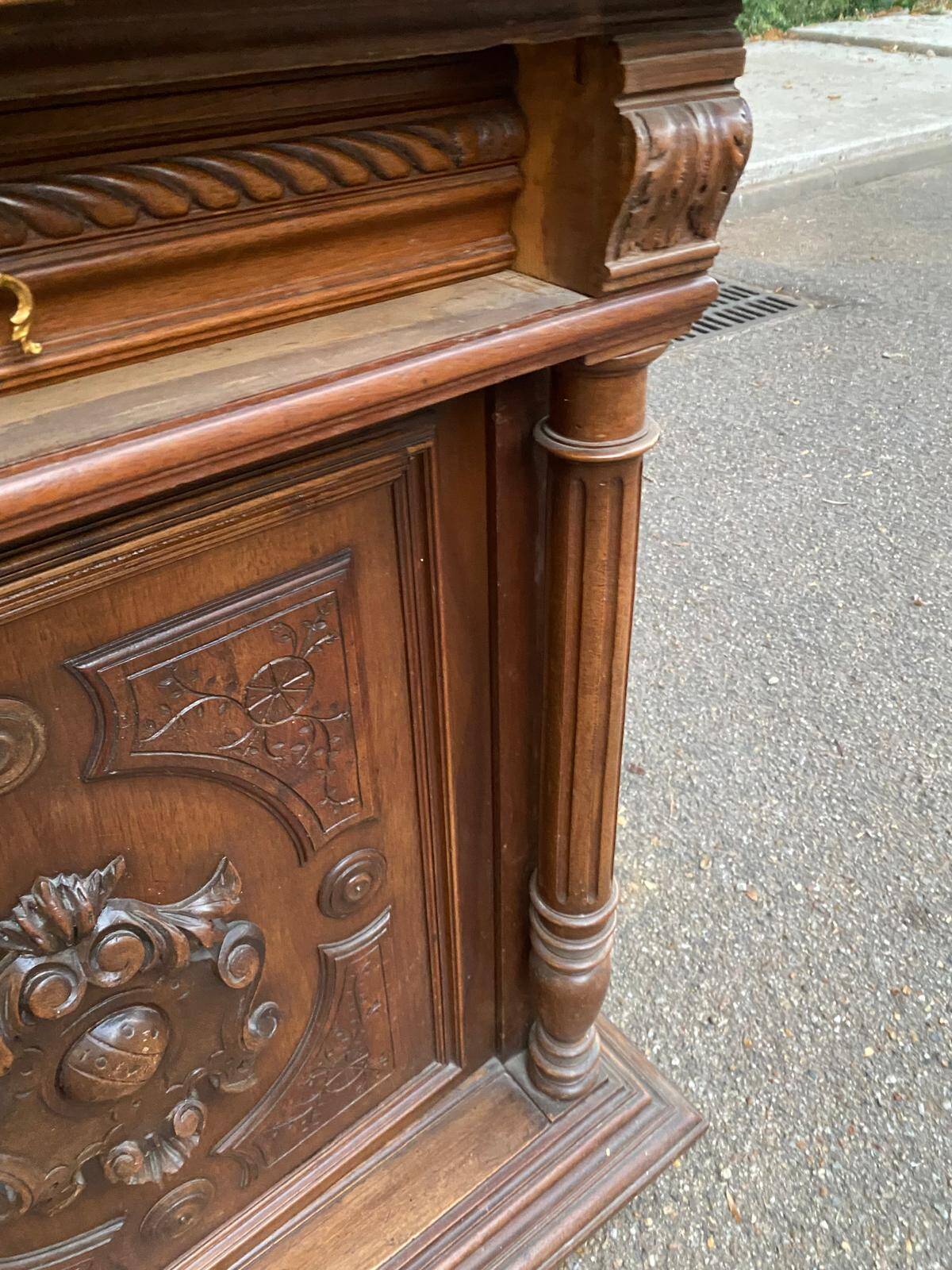 Henri II sideboard in carved wood, 1930.