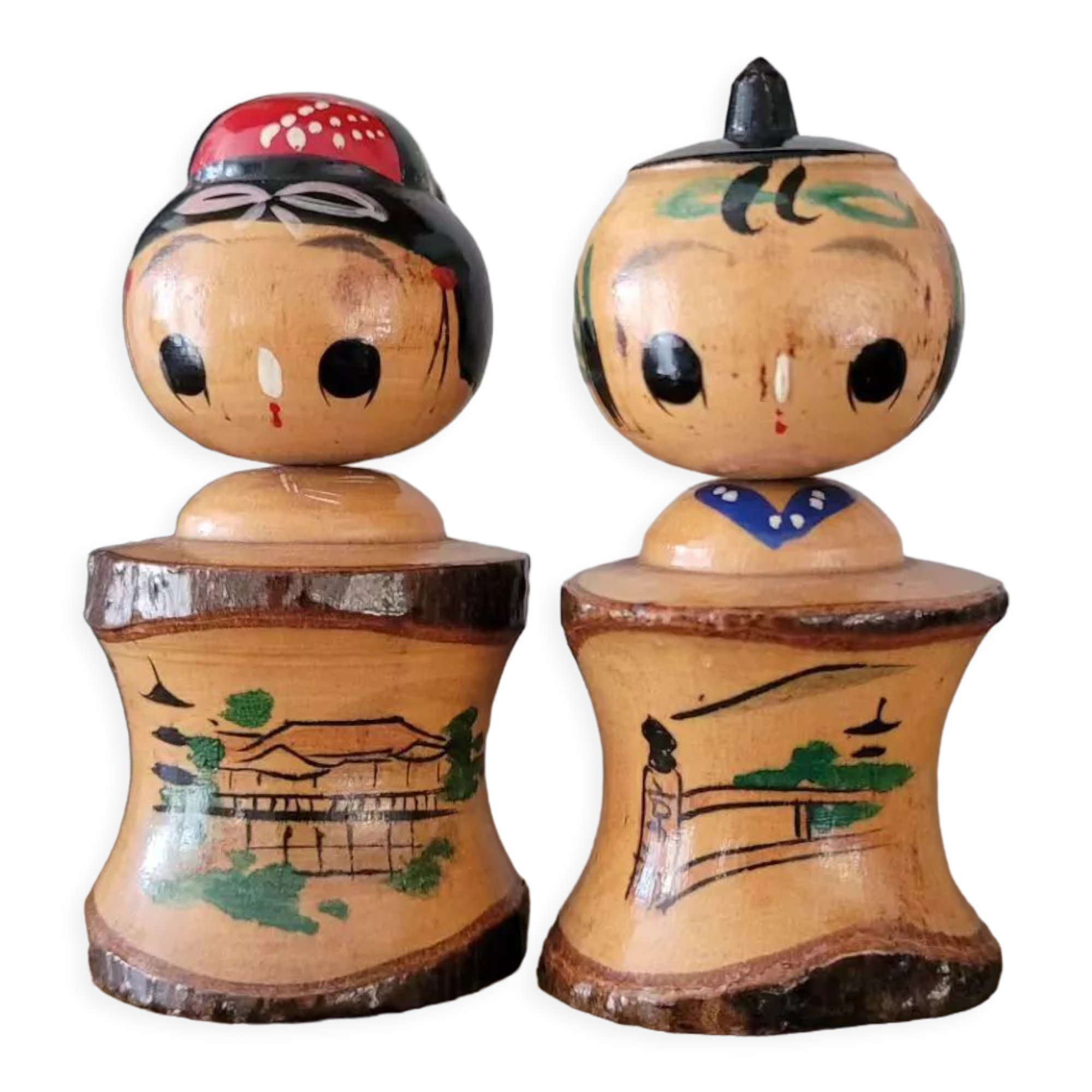 Two Kokeshi dolls