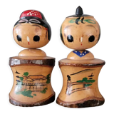 Two Kokeshi dolls