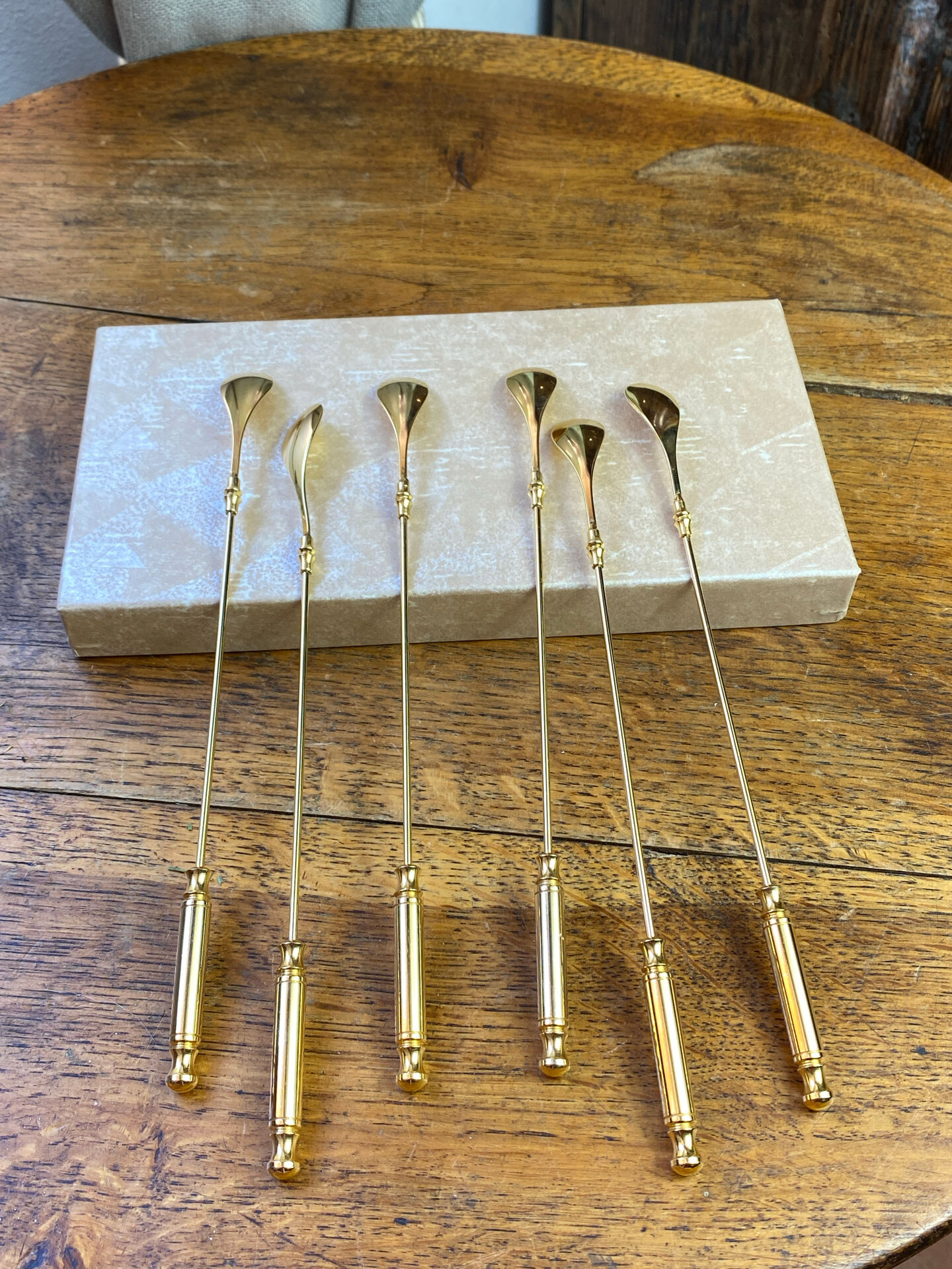 Long coffee or cocktail spoons in gold plating