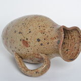 Pitcher in old sandstone