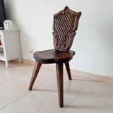 Brutalist tripod chair in carved wood 19th century