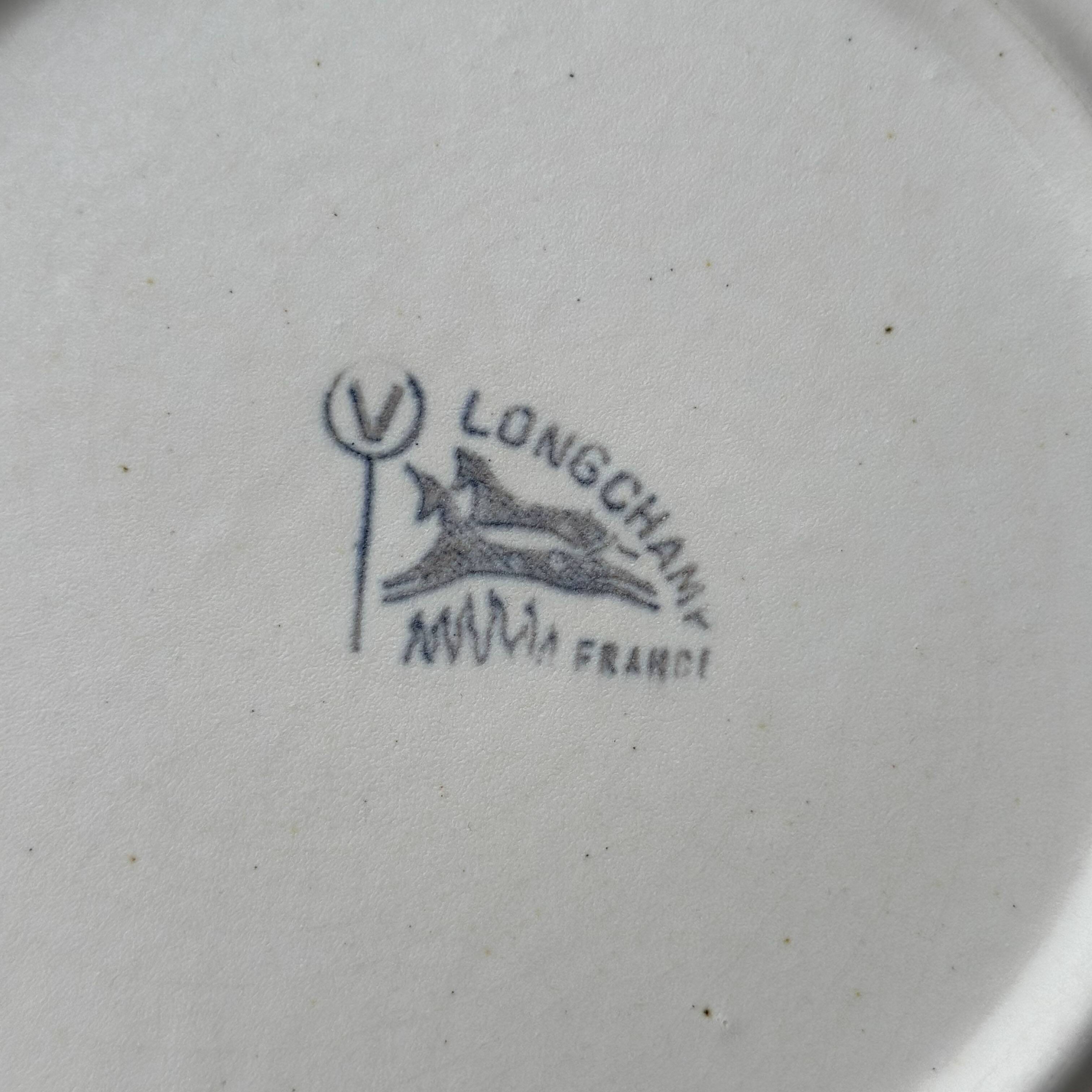 Set of 4 vintage desert plates by Longchamp