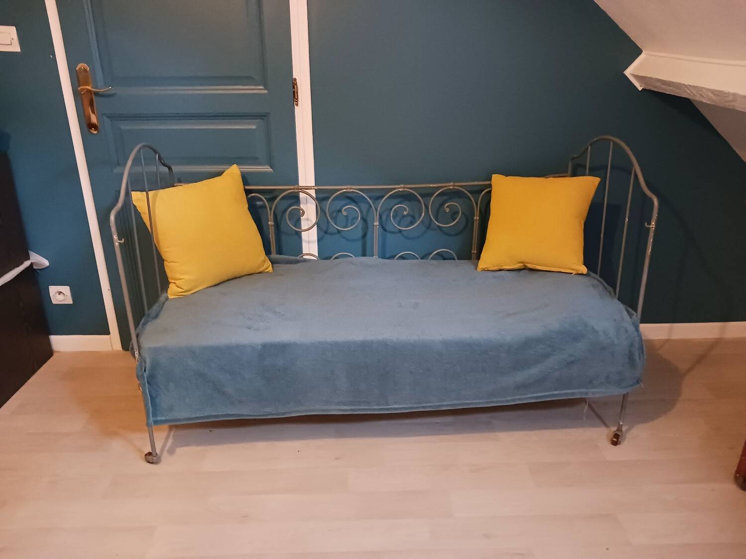 Wrought iron children's bed from the late 19th century.