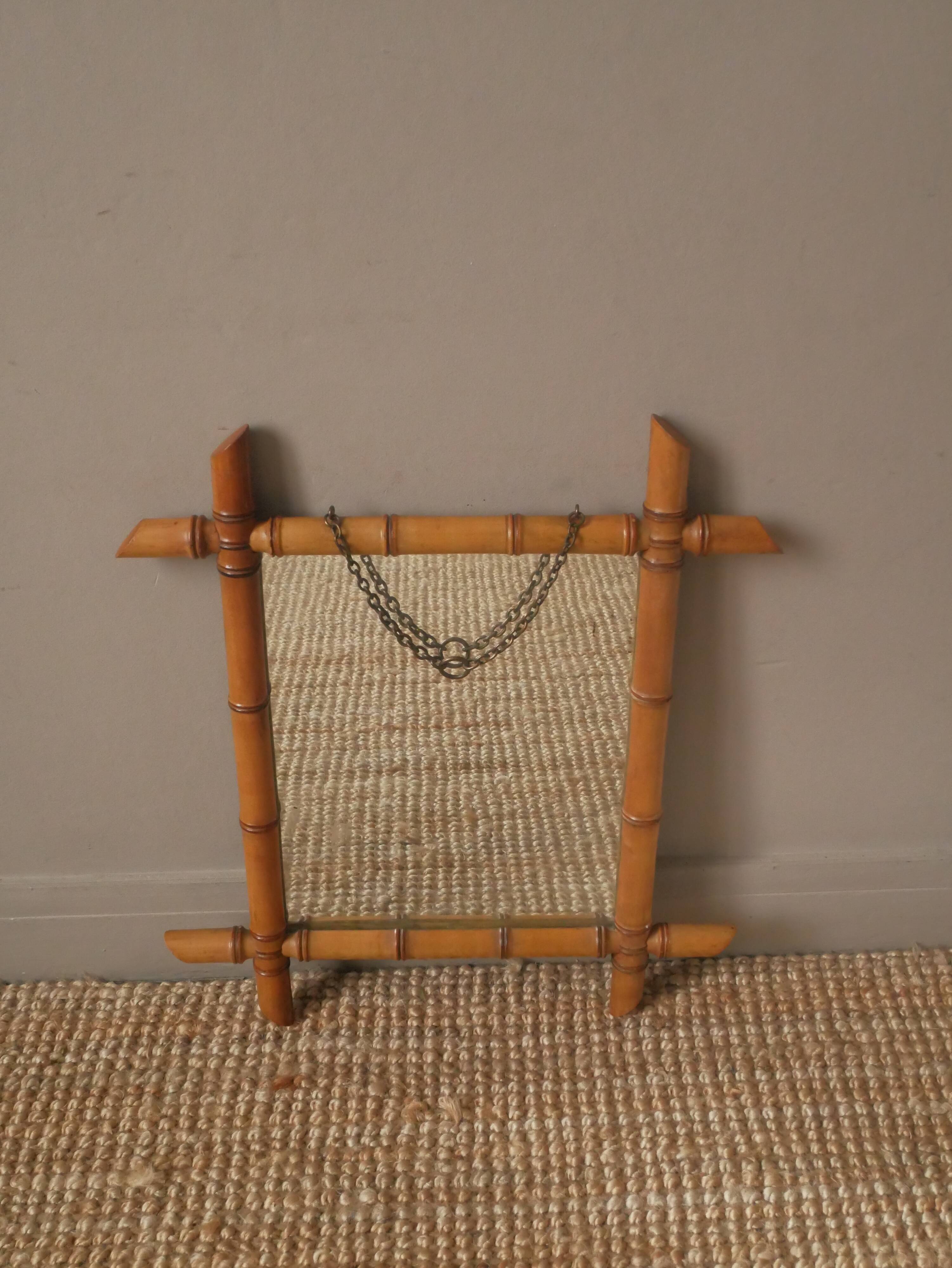 Vintage bamboo wooden mirror with retro bohemian spirit