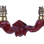 Pair of art deco wall lights in carmine red / burgundy earthenware.