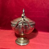 Antique sugar bowl on a stand with a lid and interior lining in velvet.