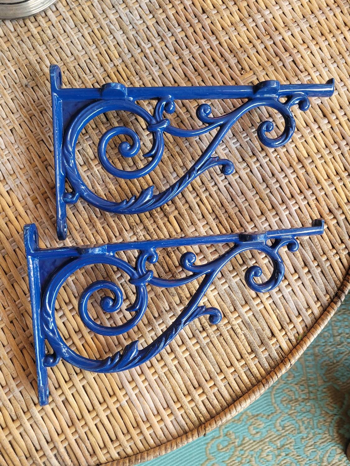 Pair of blue wrought iron shelf brackets