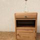 Vintage bedside table with compass legs