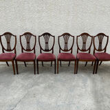 Set of 6 wooden chairs sitting red