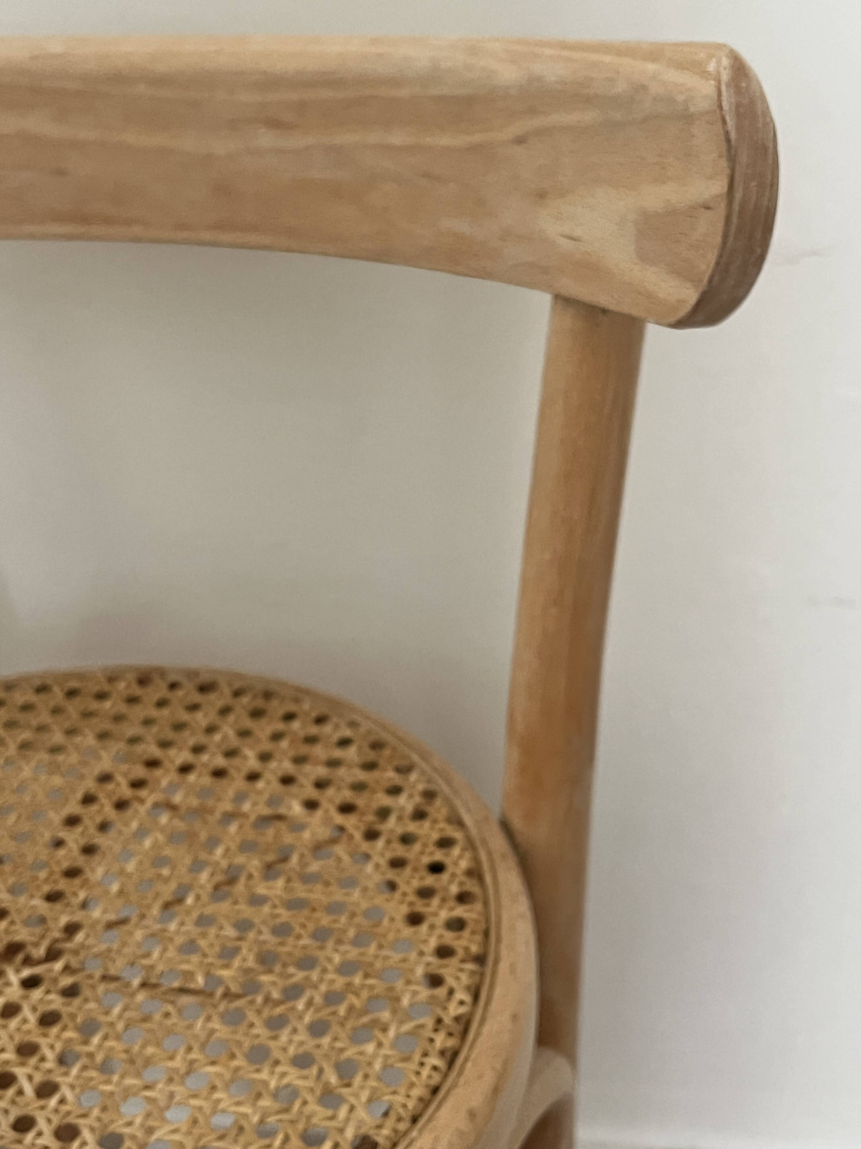 Pair of high chairs, curved wood and caning.