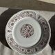 Set of 6 vintage dessert plates made in Poland with a plant motif.