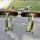 Pair of Art Nouveau coat hooks in bronze and chestnut, circa 1930.